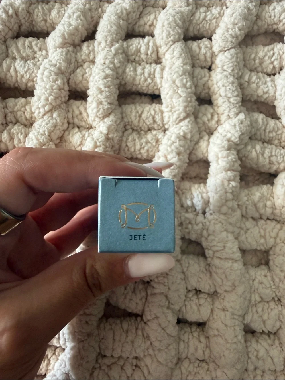 Merit tinted lip oil in Jete